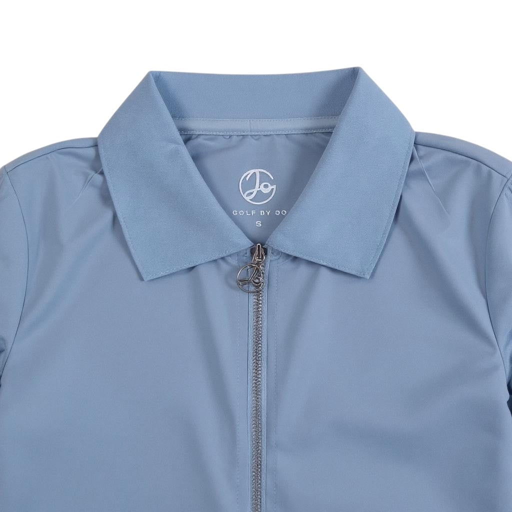 GOLF BY JO light blue zip-up golf polo shirt with a tailored collar and moisture-wicking performance fabric.